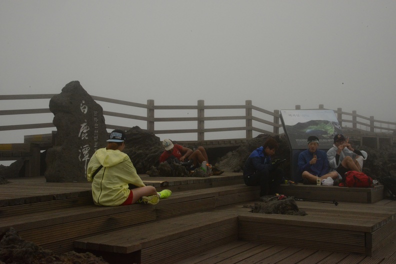 people resting at the summit.JPG